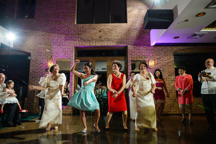 everybody dancing at the grand atrium wedding