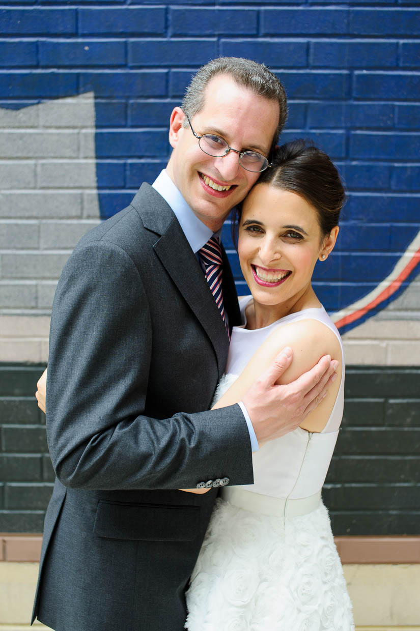 wedding portraits with a rockville town center mural