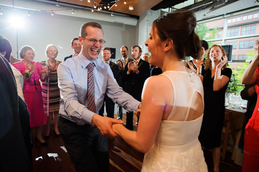 bride and groom during jewish dancing