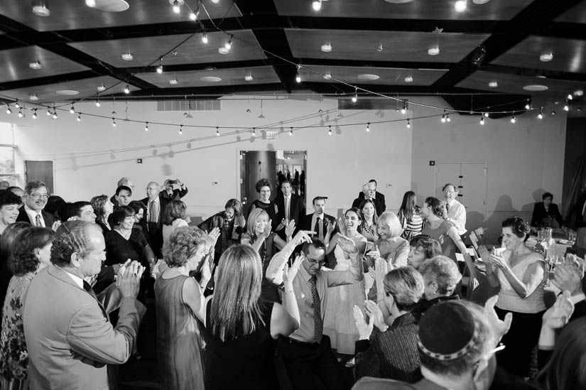 groom dancing during klezmer time at visarts in rockville