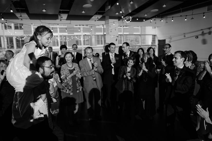 flower girl above the crowd at visarts at rockville wedding