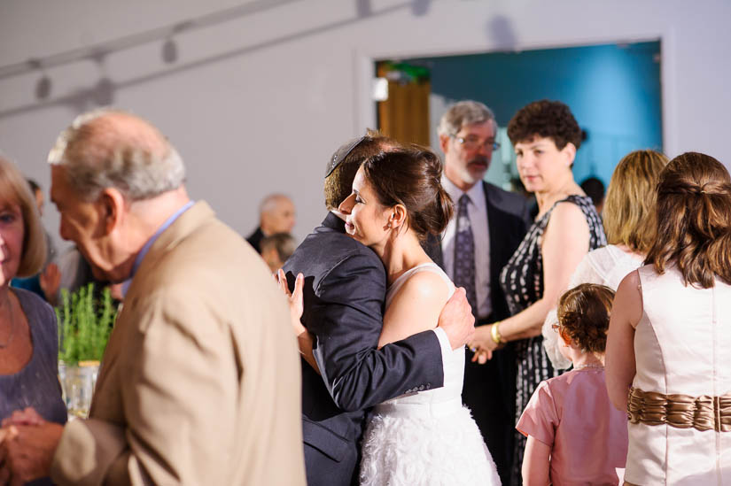 bride and her father hugging at visarts