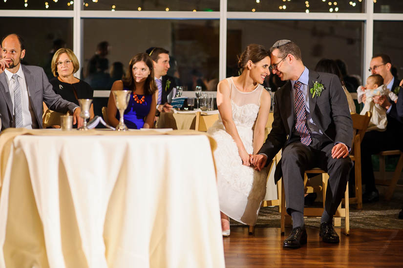 bride and groom during seven blessings at visarts at rockville wedding