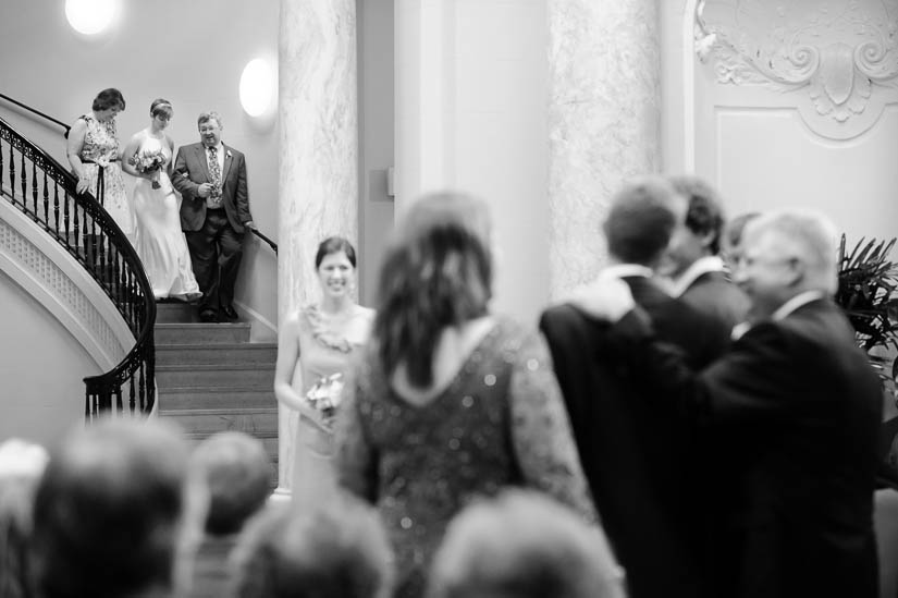 bride coming down the stairs at carnegie institution for science wedding