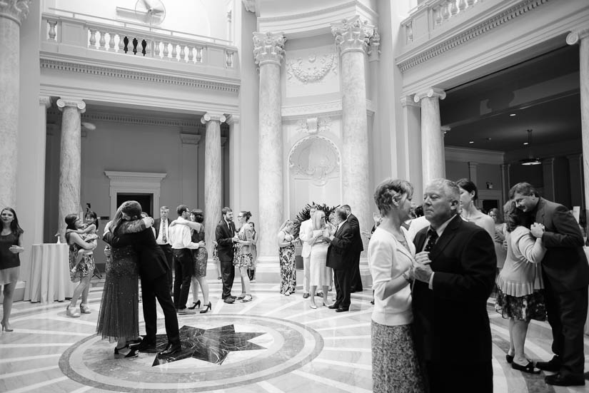 everyone dancing in the rotunda at carnegie institution for science wedding