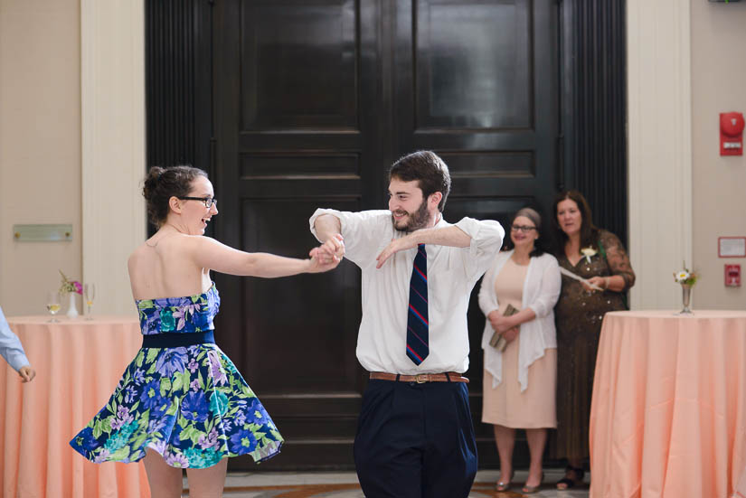 guests dancing down the aisle