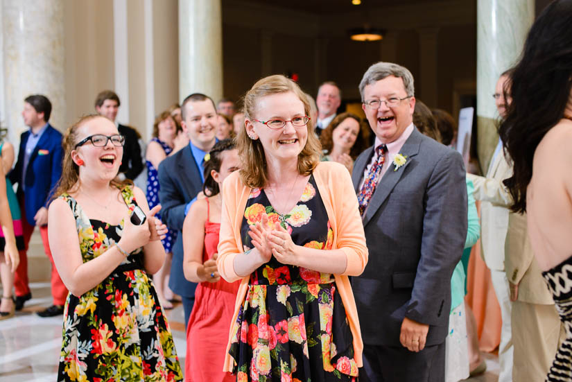 bride's family laughing at the end of the wedding