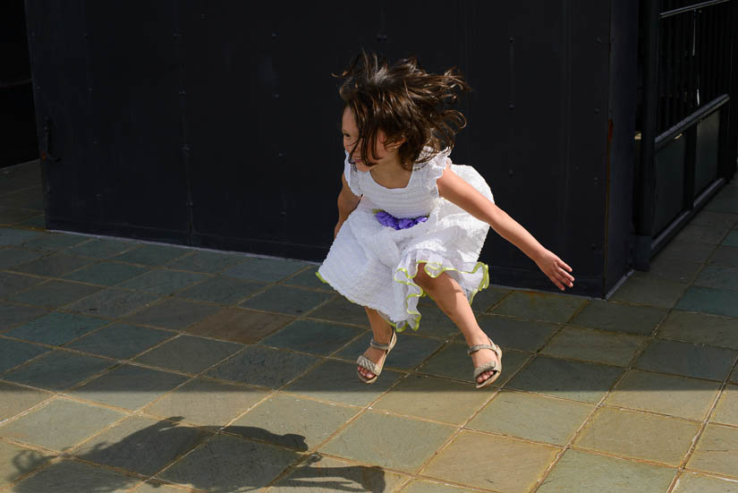 little girl jumping at arlington, va courthouse wedding