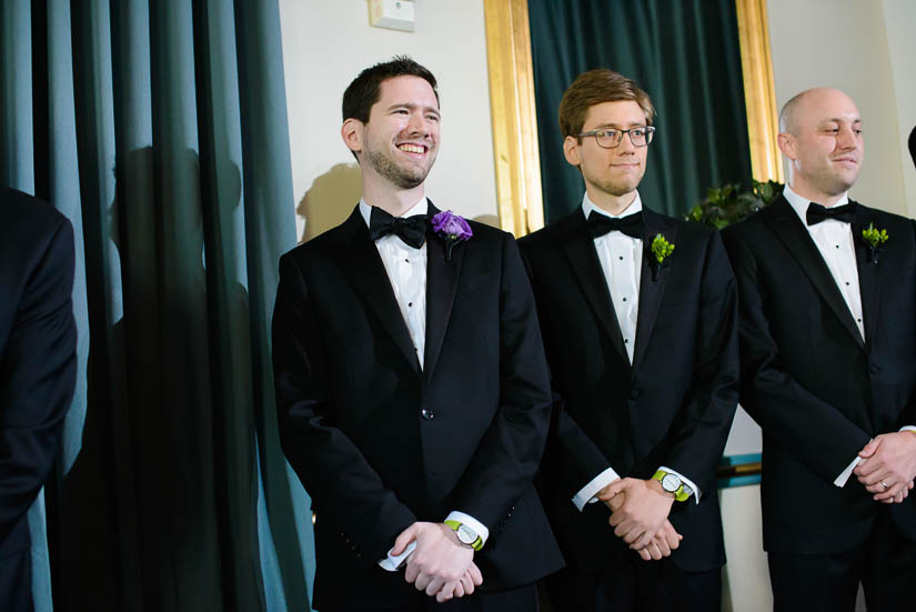 groom seeing his bride walk down the aisle