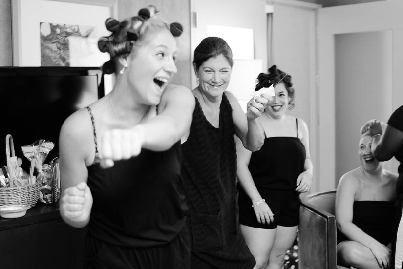 bride's family dancing at the hotel room