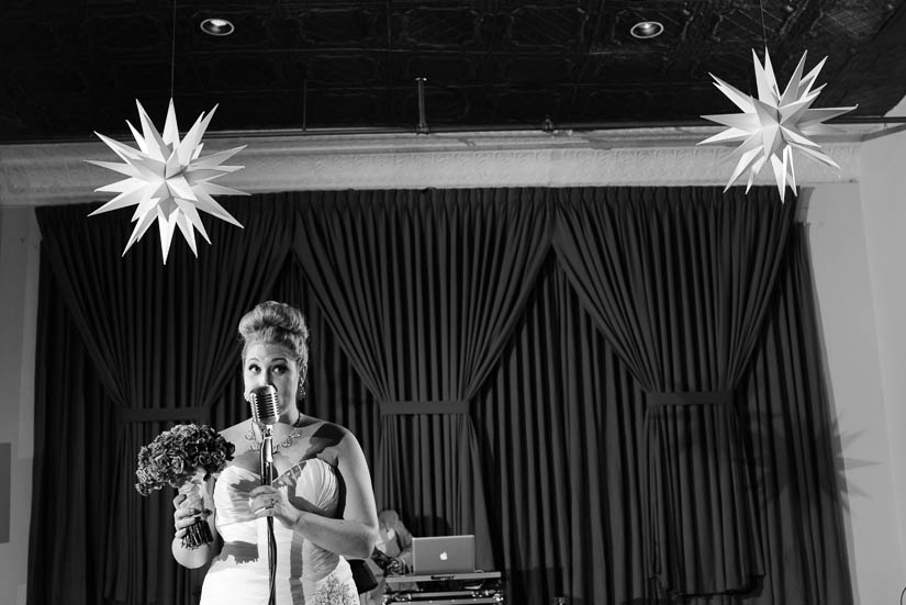 bride giving her bouquet to her grandmother