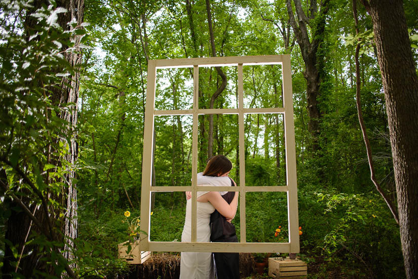 hugging during portrait session at same-sex wedding