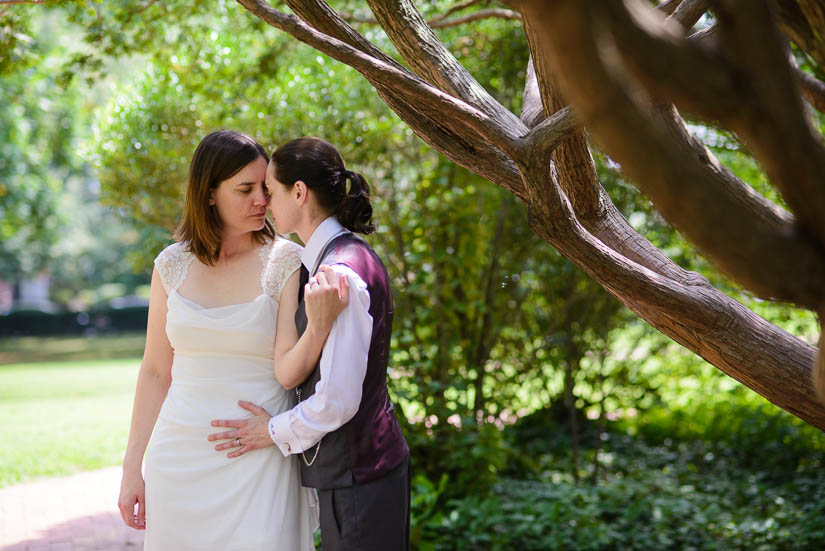 same-sex wedding posing in annapolis, md