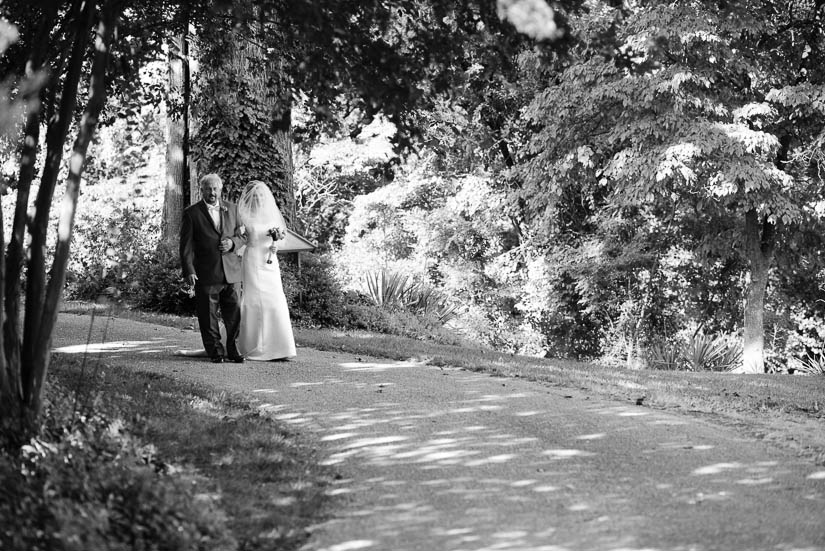 bride and her father walking to the wedding at patapsco female institute