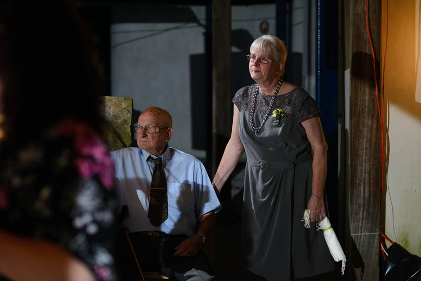 mother and grandfather of the bride looking on during father-daughter dance