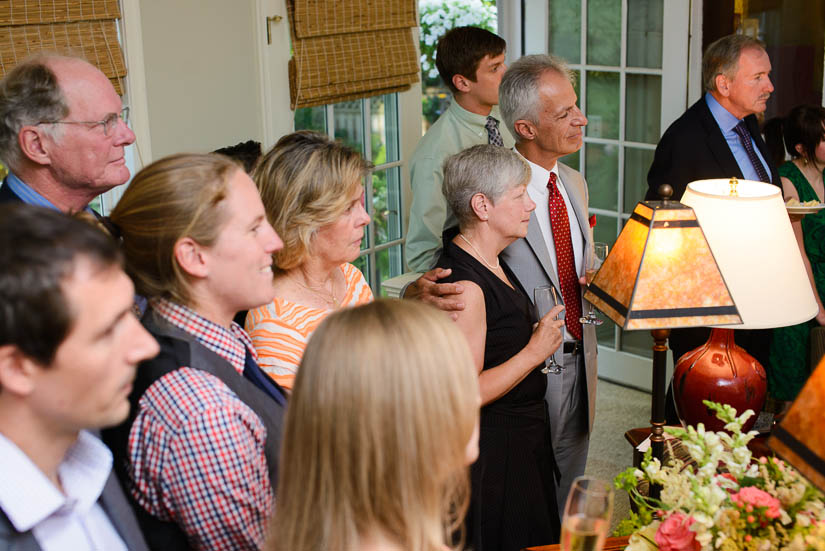 toasts at the family home after the wedding