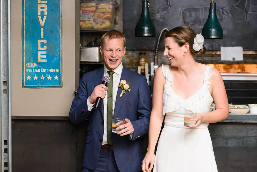 bride and groom giving a toast at american ice co