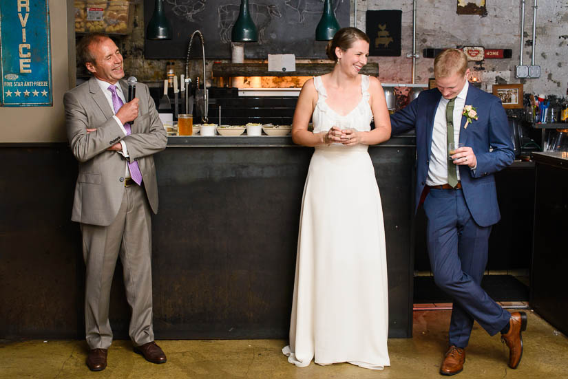 couple and the groom's father at american ice co wedding