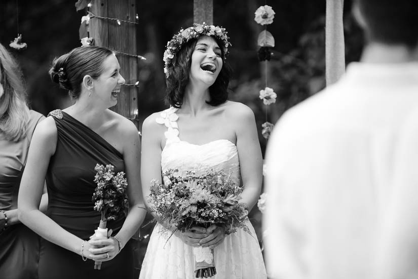 bride laughing during the woodlands at algonkian wedding ceremony