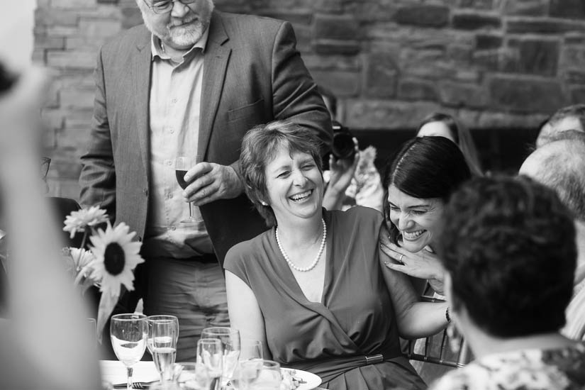 bride singing happy birthday to her mother