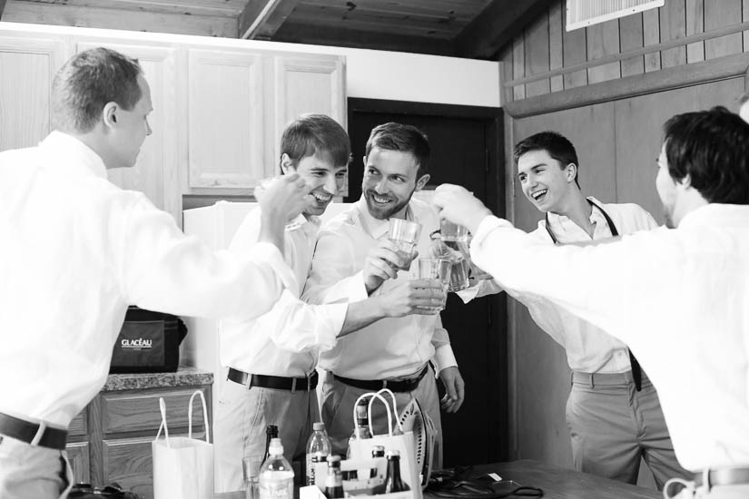 groom and groomsmen getting ready for the wedding