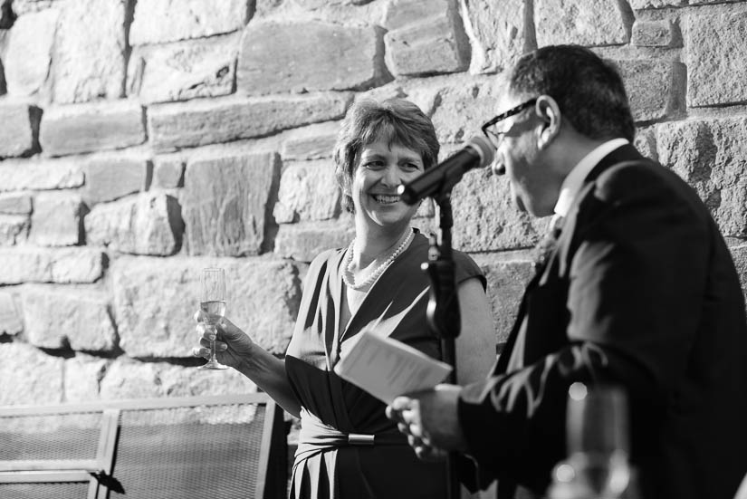 bride's parents speaking during the wedding reception