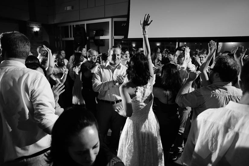 dramatic lighting on the dancefloor at the woodlands at algonkian wedding