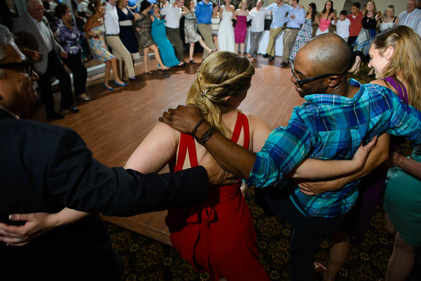 dancing in a circle at the woodlands at algonkian wedding