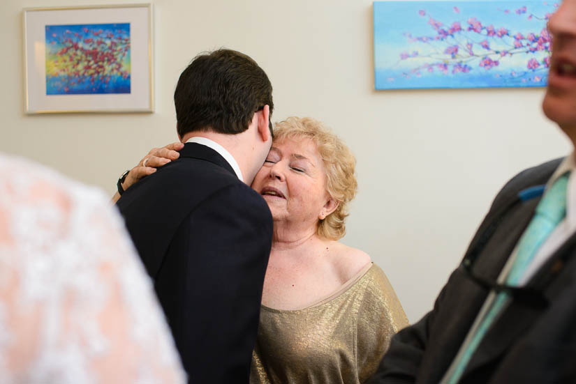 grandmother hugs her grandson in washington dc wedding