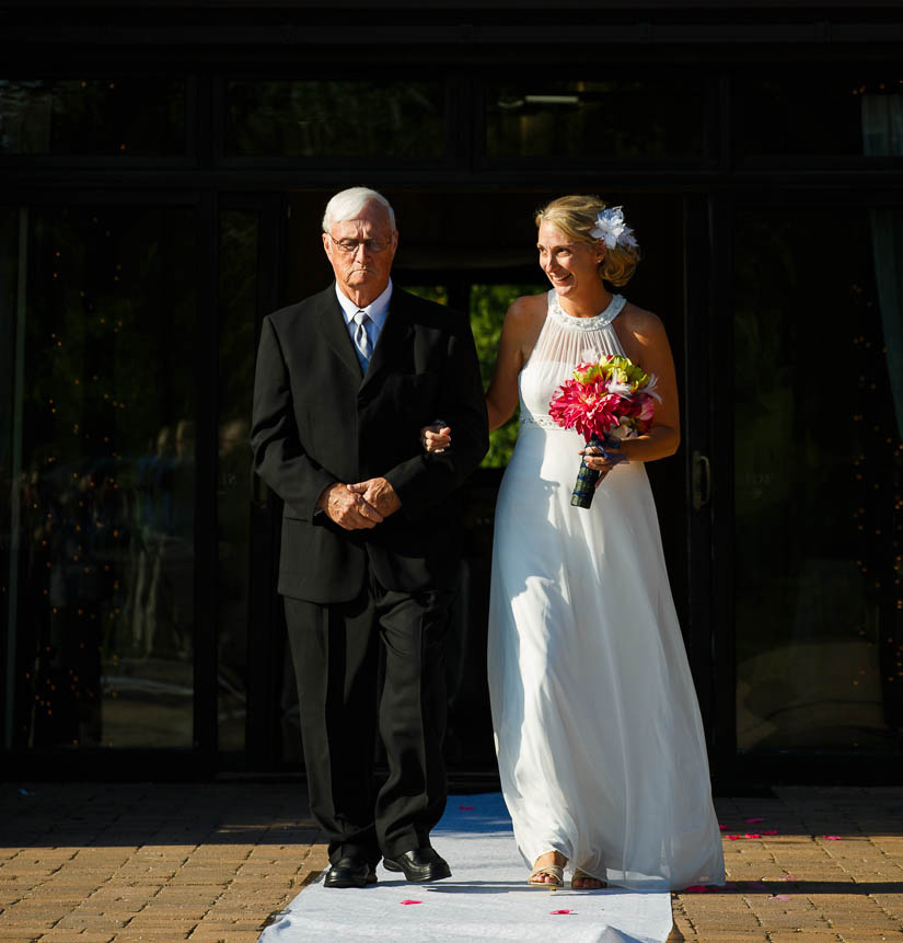 bride and her father walking down the aisle